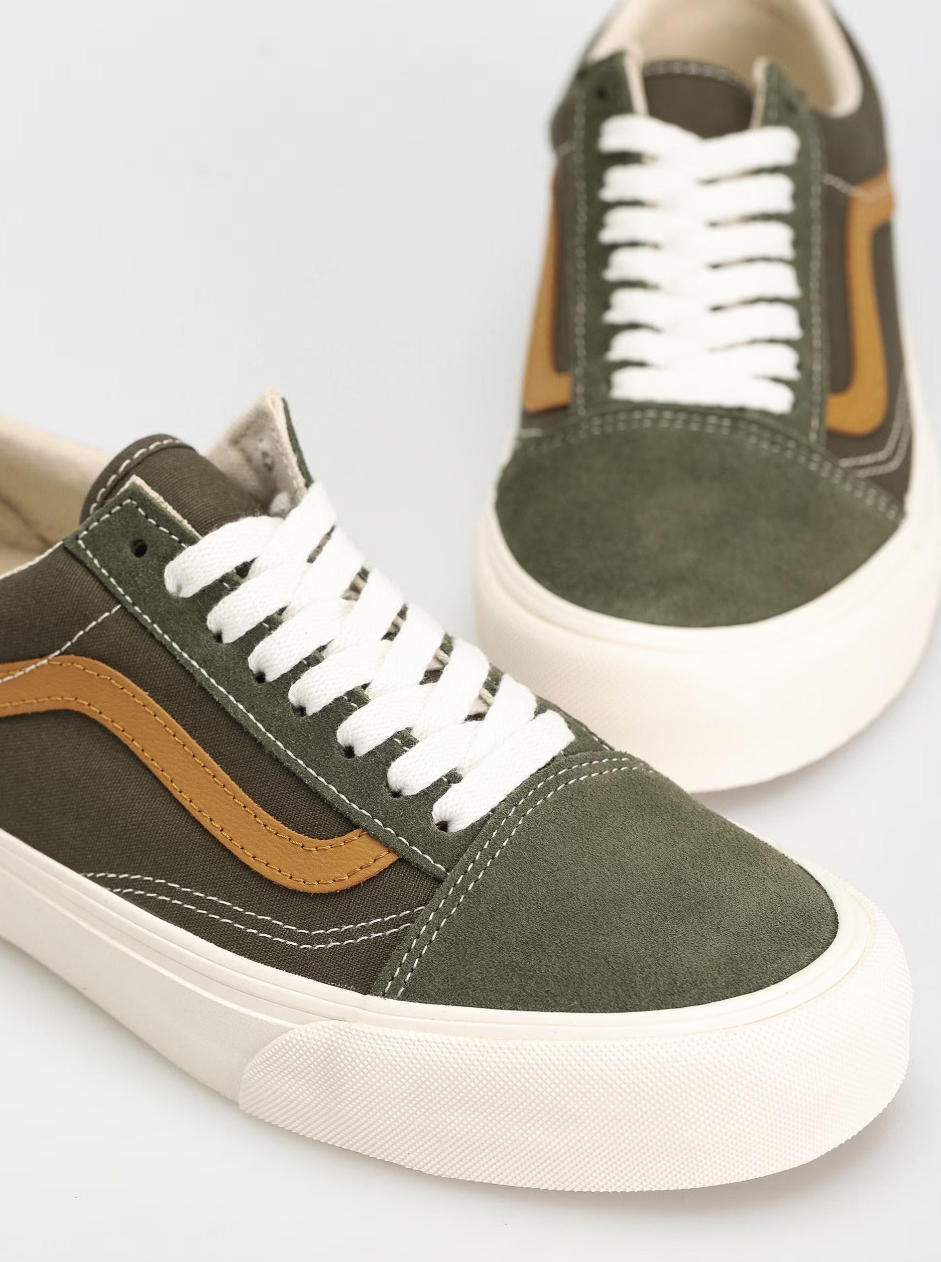 Olive green vans with gold outlet tips