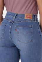 LEVIS 57969-0124 CURVY ANIMAL KINGDOM SKINNY JEAN-MED WASH